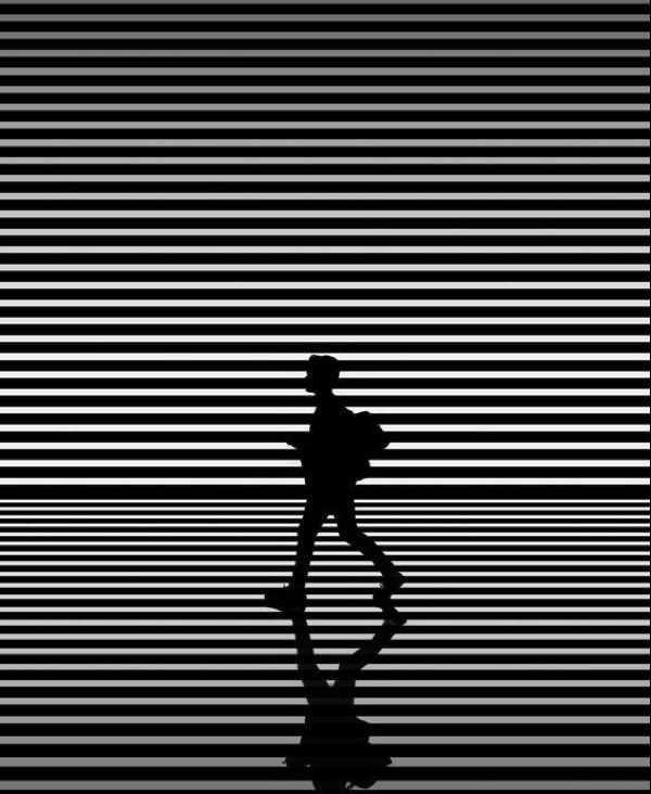Reference: a silhouette walking across black and white stripes